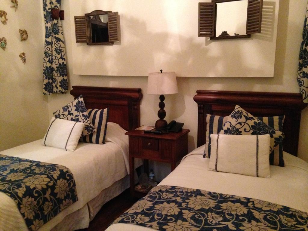 Roka Plaza Hotel Boutique Ambato Habitación foto